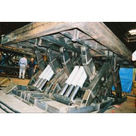 The heavy duty scissor lift features capacities of up to 120,000 lbs.
